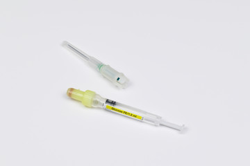 Obraz premium Single use syringe isolated on white