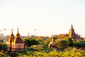 Fototapeta na wymiar Hot air balloons fly over Bagan temples