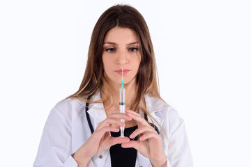Naklejka premium Female doctor with a needle.
