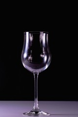 Closeup view of glass isolated on black background. Beautiful background.
