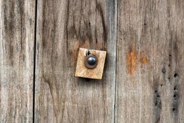 Rusty lock of old gates.Vintage door with metal handle. © chollacholla