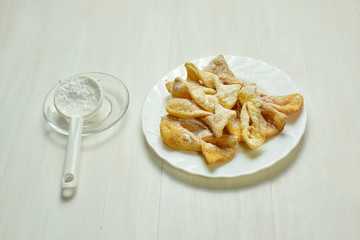 angel wings with powdered sugar