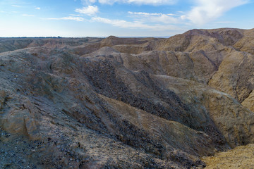 Fototapeta premium Landscape of lissan marl rocks along the Arava Peace Road