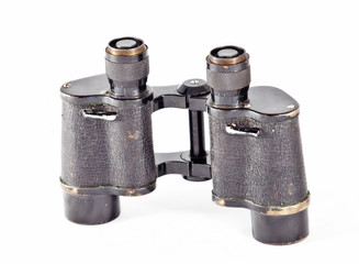 Old binoculars  on a white