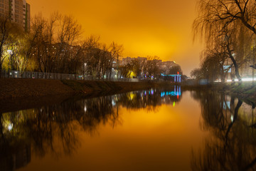 reflection of autumn trees in water