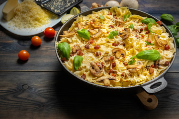 casserole  pasta with mushrooms, sausage and cheese