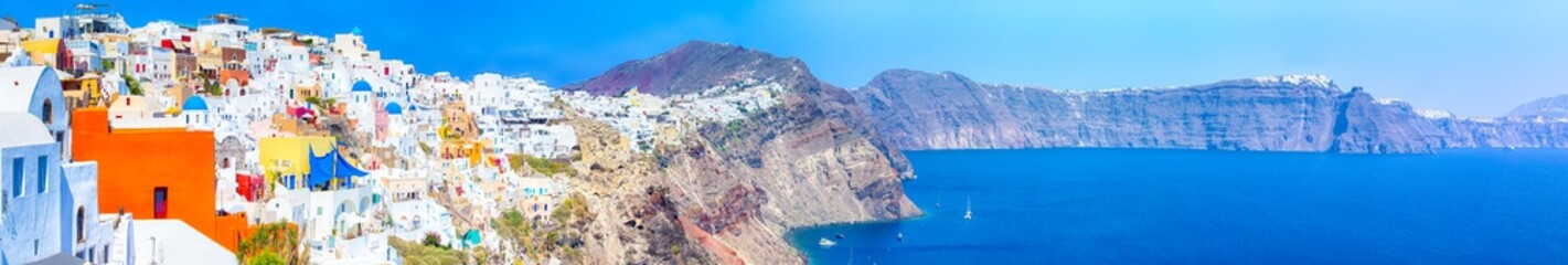 Travel Destinations. Picturesque Panorama of Oia Village in Santorini Island Located on Volcanic Calderra at Daytime.