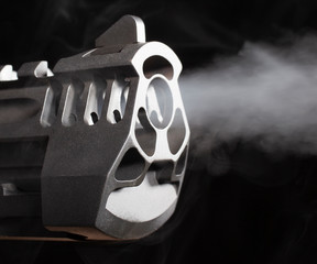 Smoking coming out of a gun