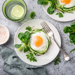 fried egg in zucchini noodle nest