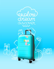 Blue plastic suitcase on blue background. Explore dream discover