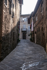 Fototapeta na wymiar narrow street in old Italian town