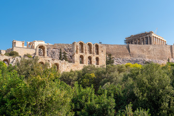 Fototapeta na wymiar Hill of Acropolis seen from the main promenade in Athens.