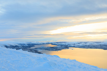 Lake Kilpisjärvi, Finnland at sunrise in winter wonderland, view from Mountain Saana