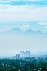 Obraz premium Beautiful cityscape on misty Bandung city