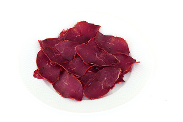 veal bacon, thinly sliced veal bacon, white background