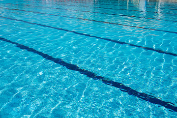 Fototapeta na wymiar Rest and summer. Large swimming pool.