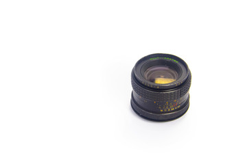 Close up of old camera lens isolated on white background