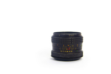 Close up of old camera lens isolated on white background