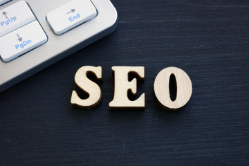 Abbreviation SEO- Search Engine Optimization from wooden letters.