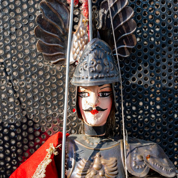 Portrait of a famous character of the puppets. Created by a master puparo still present. It derives from the tradition of puppets that has been handed down from generation to generation.