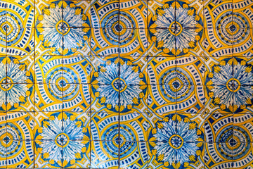 Decorative tiles (or azulejos) in a wall in the Iberian peninsula