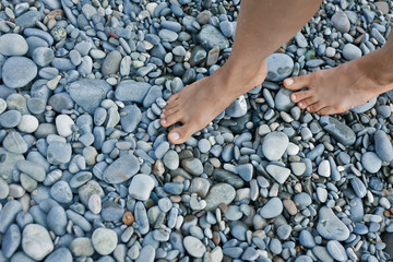 Feet on Pebbles