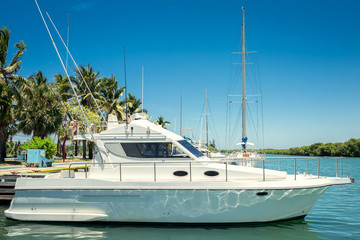 Fototapeta premium Snow-white maritime yacht near the pier