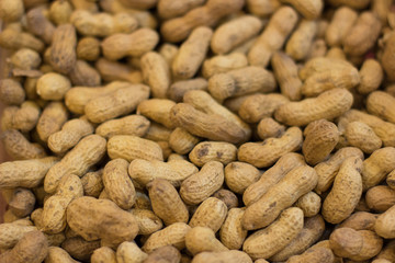 peanuts in shell natural food seems market mall background surface counter 