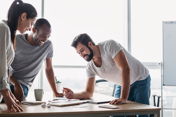 Young professional team discussing business plan in the office