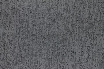 Gray stucco background.