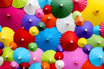 Background of collorful traditional Asian paper umbrellas