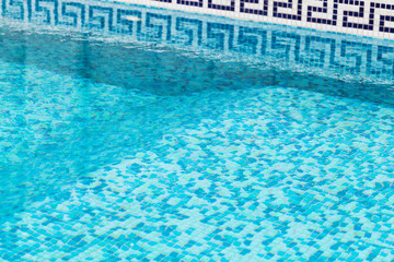 Empty pool, blue water, background