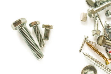 Flat lay of bolts  isolated on white. Self Drilling screws. Isolated fasteners. Connecting material on white background