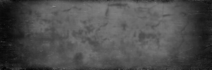 Blurred monochrome background scratch strokes.