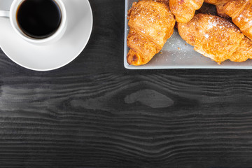 Breakfast concept, Cup of coffee and croissants