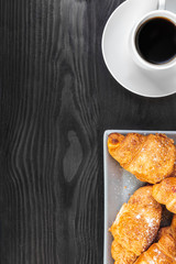 Breakfast concept, Cup of coffee and croissants
