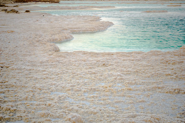 Sunset view of salt formations in the Dead Sea