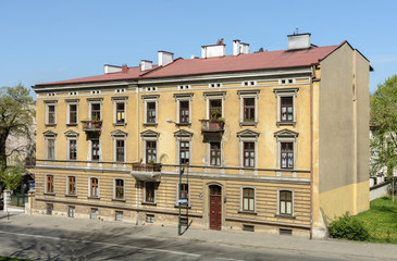 Fototapeta na wymiar Three-storey residential building on Podzamkova street in Krakow. Poland.