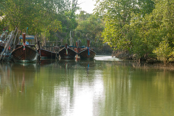 4 boats parked in small canals
