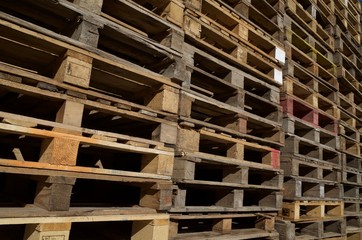 Stacked pallet boards, U.K. Recycle items.