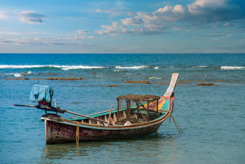 Fishing boats parked by the sea