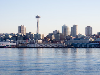 View of Seattle waterfront from the sea at sunset