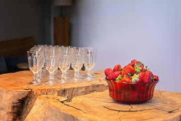 Ripe strawberries  and glasses