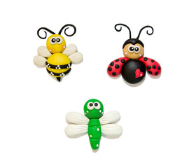 modeling clay beetles, insects, on a white background. Funny plasticine beetles. Bee, coccinella,...