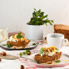 carrot fruit cake with nuts and cream
