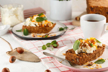 carrot fruit cake with nuts and cream