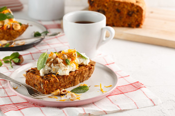 carrot fruit cake with nuts and cream