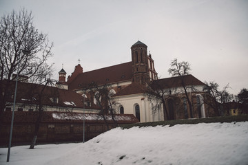 St. Anne's Church and Bernardine Monastery in Vilnius, Lithuania. Tourism at winter season
