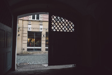 View on Vilnius old town street from house arc
