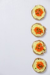 Caviar sandwiches isolated on white